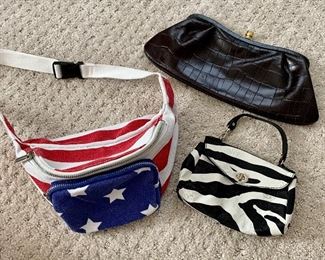 Item 153:  Lot of Assorted Bags - red, white and blue fanny pack, black clutch and black and white stripe: $12