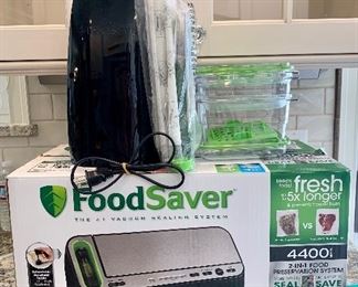 Item 129:  Food Saver: $95 - comes with lots of bags