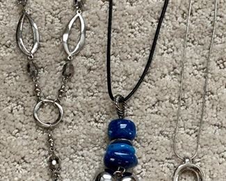 Lot 23:  Three necklaces, one with heart and big blue stones: $12