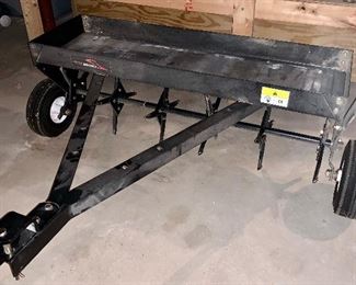 Item 174:  Brinly 40" Lawn Aerator PA-40 - attaches to lawn tractors: $150