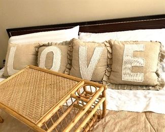 Cute “LOVE” pillows and bamboo tray (bed linens not for sale)
