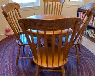 $195 round ok table with four high chairs
