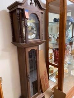 $250 grandfather clock with brand new pendulum and extra pieces