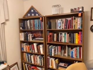 Lots of books, lots of bookcases. $75 Each