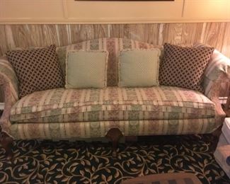 . . . a nice upholstered couch with Queen Anne legs
