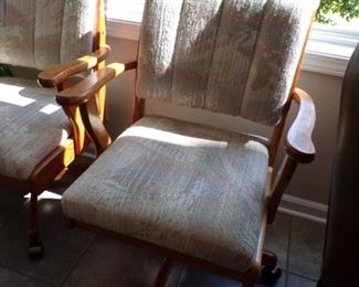 closeup of 6 chairs on rollers