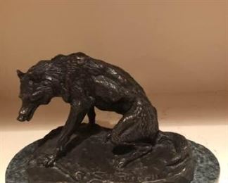 CM Russell Bronze Wolf with Bone Sculpture