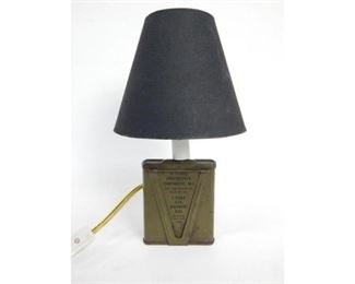 Nice small size desk lamp crafted from an old Military tin canister, the lamp is in good working condition and stands 10'' tall   $12.00