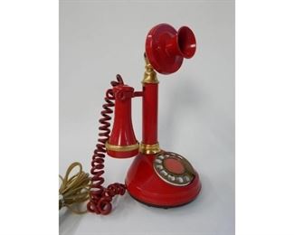 Vintage Deco Tel brand tall red plastic and brass rotary dial Candlestick Telephone, the phone is in good condition and stands 12'' tall $20