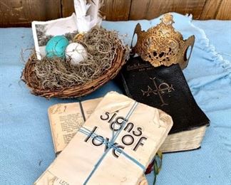 Lot of old books, bird nest assemblage and an old decorative crown. All for $15