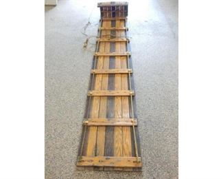 Long 8 foot solid wood Toboggan Sled, the sled shows years of use with wear and warping in some of the wood and some splitting near the front on the sled where the wood curves    $15.00 WAS $35