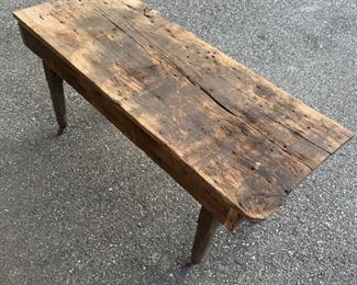 Antique primitive wood bench or coffee table on industrial wheels. Wormy wood. Great look and very sturdy. $45