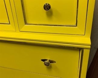 Close up of yellow Mid century modern dresser
