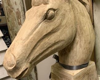 An amazing carved horse head sculpture. Carved from one piece of wood. Really a stellar piece. In great condition. Measures 24" x 23" x 10." $200 WAS $275