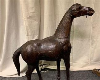 Large leather horse. Stands. All leather. Vintage. Measures 40" x 34" x 13". Great vintage condition. Has one small gash on side but it appears to be a surface one, doesn't detract. $85