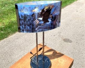 Two sided military lamp. New. Works. Glass panels with the American Flag and American Eagle on each side. When the lamp is turned on both sides illuminate.  Stands approximately 22 " high. Never used. $30