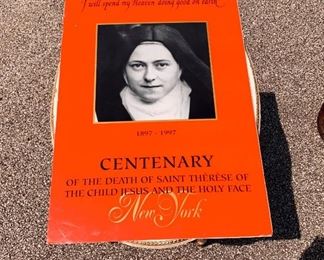 Large poster adhered to mounted cardboard celebrating the Centenary Celebration of the Saint Therese of the Child Jesus. New York. Measures 28" x 19." $15
