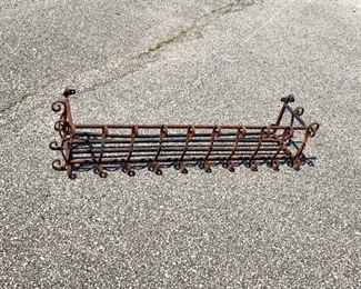 Full view image of old wrought iron window box or dish/pot rack.
