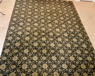 $85- 11ft’ L x 8ft’W. Area Rug Navy Blue Background.