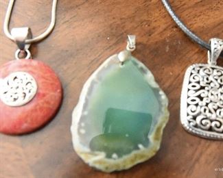 Sterling snake chain, with red stone. SOLD
Sterling pendant on cord necklace $12
1.5" x 1". 16" cord Polished geode slice pendant SOLD