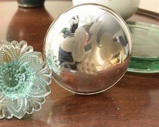 Single Aqua Sandwich glass tieback $8
2.75" Crack in glass.
Antique mercury glass single tieback $12
3.75" wide, 4.5" tall
