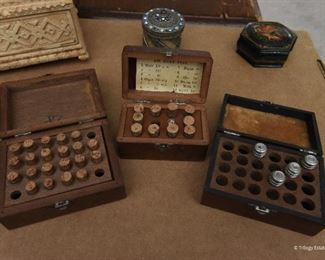 Lot of three Watchmaker's Jewels $75
The three boxes hold small vials with balance and roller rubies