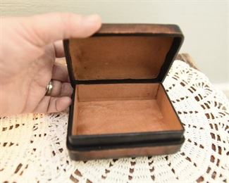 Embossed leather box $12
4.5" x 3.5" x 2" Leather is continuous on back side to act as a hinge for the lid.