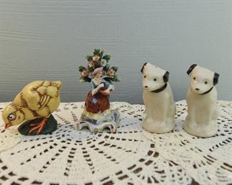 RCA "Nipper" S&P shakers $22
marked 55-63 on bottom. No stoppers. 3.5" tall
Chalkware Chick. One small chip in paint on tail feathers. 2.75" tall $24
Chelsea porcelain figure $5
Two broken leaf tips at very top. 4" tall
