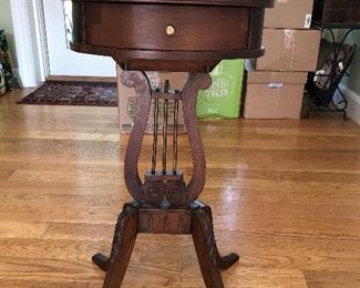 Oval lyer stand with four legs $35
Oval top is 14" x 10", legs footprint is 16" x 12"
