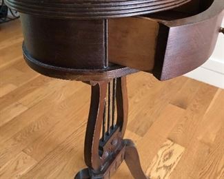 Oval lyer stand with four legs $35
Oval top is 14" x 10", legs footprint is 16" x 12"