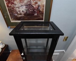 Black Wood Display Case $45
with glass shelves and top. 15" x 12" x 20"