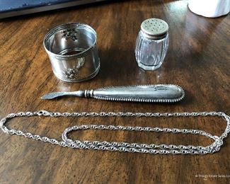 Sterling chain and grooming implement $25 unmarked napkin ring SOLD Small glass shaker $3