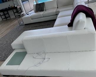 Stunning leather sectional ultra modern perfect condition.