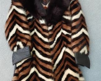 pieced mink coat with leather trim