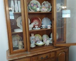 china cabinet with hand painted items. Bristol, ironstone, etc.
