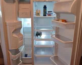 sid by side refrigerator interior. clean.