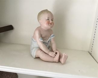 Antique bisque doll figurine 