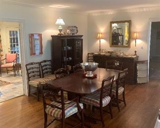 12 dining room chairs and dining room table with 5 leaves and pads! 