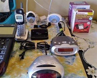 Assorted clock radios, and wireless equipment