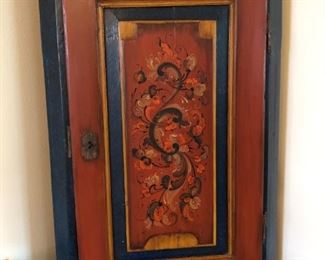 antique corner cabinet that has been repainted. Artist signed . The interior door has an amazing landscape hand painted. 