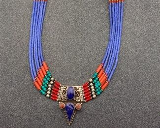 Silver and brass necklace from Tibet with lapis and coral