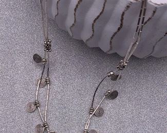 Fine silver necklace with lotus flower pendant and spiral charms from Thailand