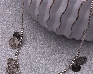 Fine silver necklace with spiral charms from Thailand