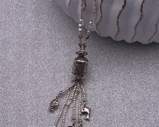 Fine silver lariat necklace with starfish, shell, dolphin, fish and leaf beaded dangles from Thailand