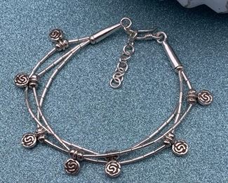 Fine silver adjustable floral charm bracelet from Thailand