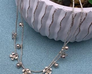 Fine silver two-strand necklace with floral and round ball charms from Thailand