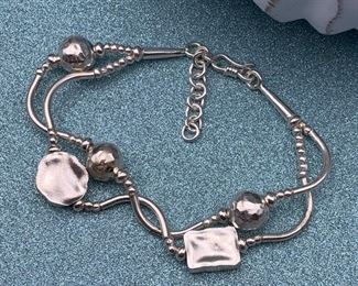 Fine silver adjustable two-strand bracelet with geometric shape beads from Thailand
