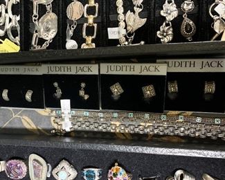 Sterling silver earrings and bracelets by Judith Jack