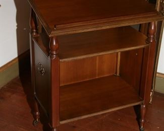 BOOK STAND ON CASTERS