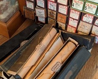 Player piano music rolls go with piano